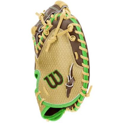 A tan and brown Wilson A1000 CM33 DUBAI 33″ Catcher’s Mitt (WBG25101RT33) featuring green and yellow laces, a green Wilson “W” logo, and a feather patch on the side.