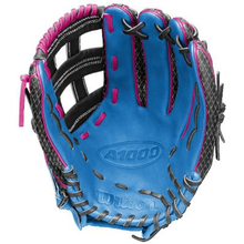 A blue Wilson A1000 1922 TUBBS 13″ Slowpitch Glove (WBG25501RT13) crafted from durable full grain leather, features black and pink lacing, black webbing, and Wilson branding on the palm.