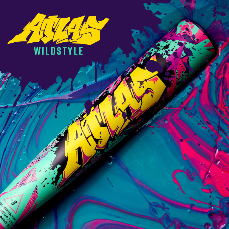 A spray paint can with bold yellow “ATLAS” graffiti and purple accents rests on a blue-and-pink splattered background, inspired by the Louisville Slugger Atlas Wildstyle (-3) BBCOR Baseball Bat: WBL4178010. “ATLAS WILDSTYLE” is at the top left.