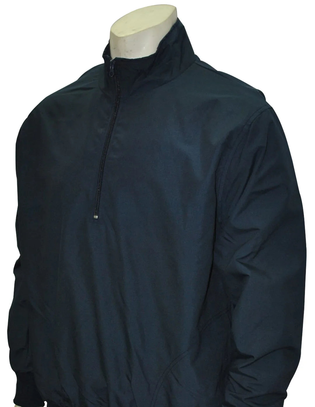 A mannequin wears the Smitty Half Zip Umpire Pullover (BBS321/BBS325), a navy, long-sleeved, water-resistant jacket with a high collar and sleek, logo-free design.
