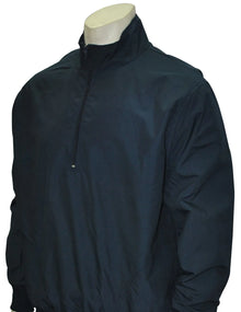 A mannequin wears the Smitty Half Zip Umpire Pullover (BBS321/BBS325), a navy, long-sleeved, water-resistant jacket with a high collar and sleek, logo-free design.