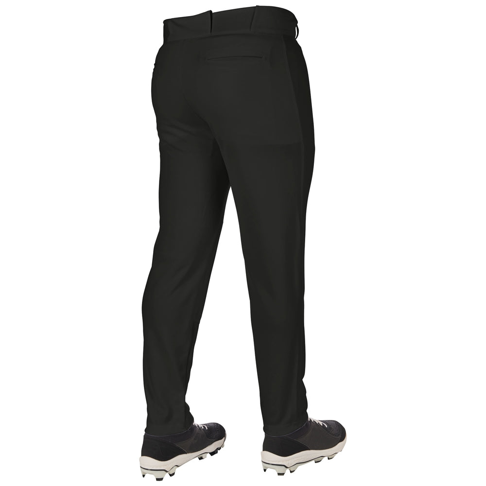 A person is shown from the waist down wearing Champro Sports Youth Triple Crown 2.0 Tapered Baseball Pants (BP64Y) in black and black-and-white athletic shoes, standing on a white background.