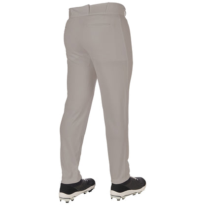 A person wearing Champro Sports Youth Triple Crown 2.0 Tapered Baseball Pants (BP64Y) in light gray and black athletic shoes with white soles, seen from the back against a white background.