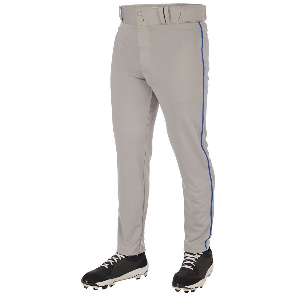A person wears Champro Sports Triple Crown 2.0 Tapered Baseball Pants with blue piping (BP66) and black cleats, shown from the waist down on a white background. These pro-weight pants offer durability and long-lasting comfort.