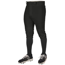 A person models Champro Sports Triple Crown 2.0 Knicker Baseball Pants (BP68) in black, paired with black knee-high socks and black-and-white cleats against a white background; only the lower body is visible.