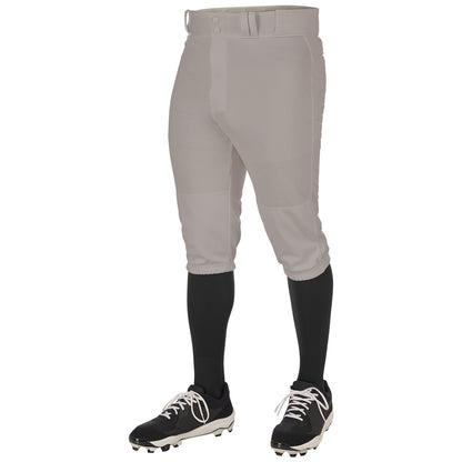 A person is shown from the waist down against a plain white background wearing Champro Sports Adult Triple Crown 2.0 Knicker Baseball Pants (BP68) in gray, paired with black knee-high socks and black cleats with white accents.