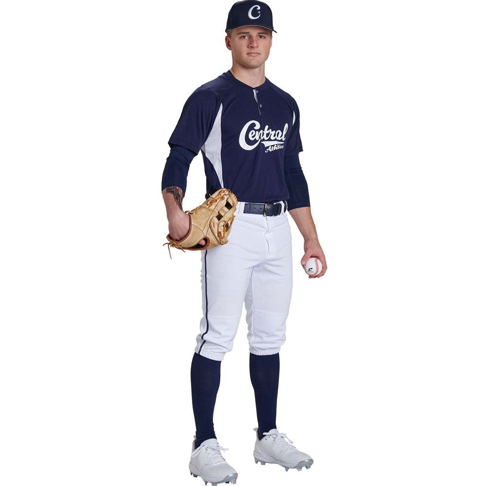 A baseball player in a navy and white "Central" uniform stands holding a glove and ball, wearing a cap, Champro Sports Youth Triple Crown 2.0 Knicker Baseball Pants with Piping (BP70Y), high socks, and cleats against a white background.