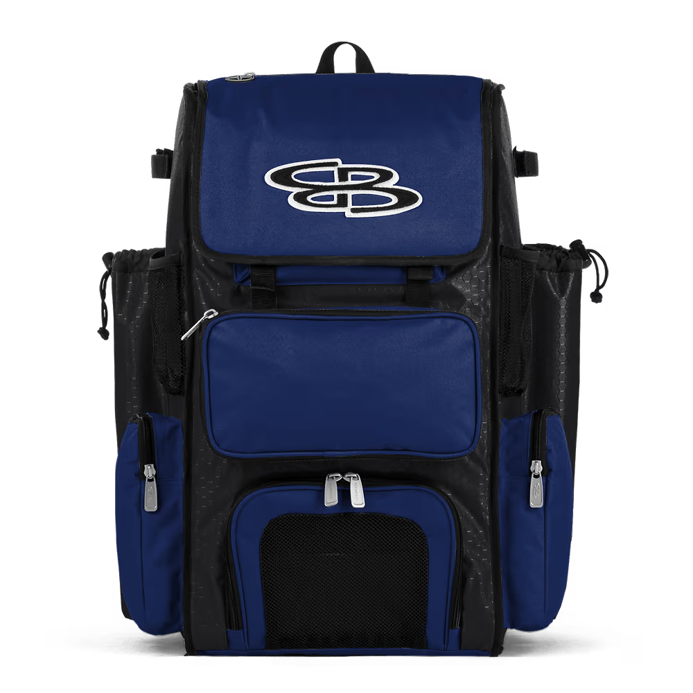 The Boombah Superpack Bat Bag: BPSP, by Boombah, features a black-royal design with multiple zippered compartments, mesh side pockets, and a white "SB" logo on the front flap, displayed against a plain white background.