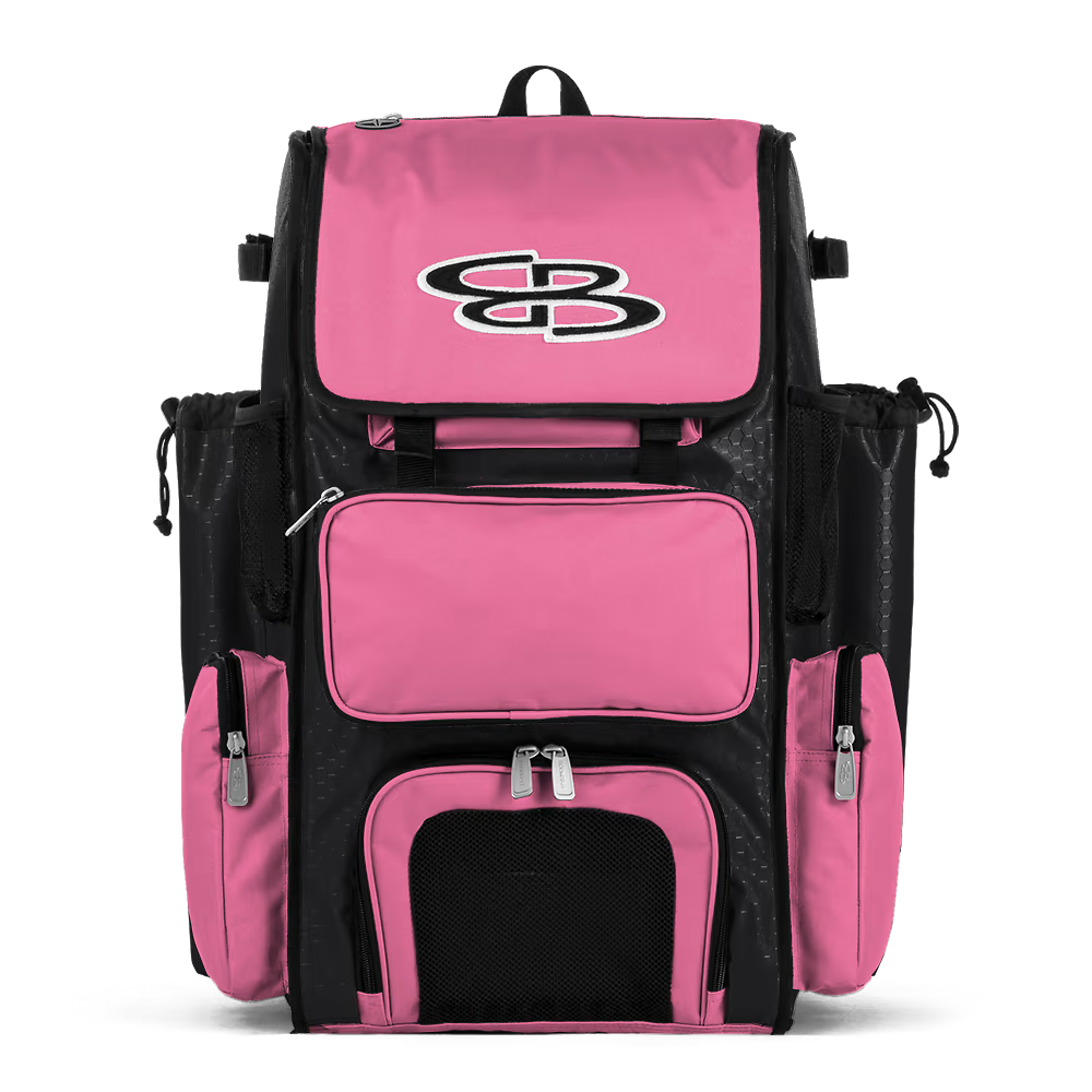 A spacious pink and black Boombah Superpack Bat Bag: BPSP by Boombah, featuring multiple zippered compartments, mesh side pockets, and a bold white and black SB logo on the front flap.