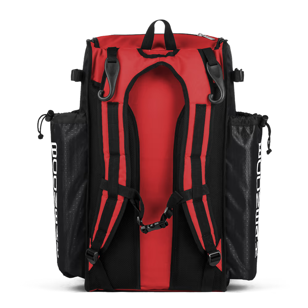 The Boombah Superpack Bat Bag: BPSP by Boombah is a red and black backpack with padded shoulder straps, black mesh side pockets, and a top handle, pictured from the back on a white background.