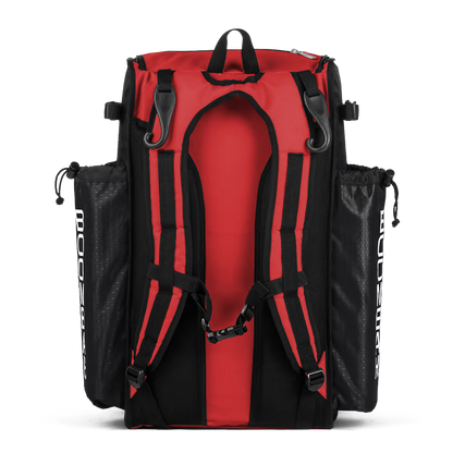 The Boombah Superpack Bat Bag: BPSP by Boombah is a red and black backpack with padded shoulder straps, black mesh side pockets, and a top handle, pictured from the back on a white background.