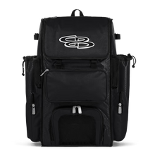 A black Boombah Superpack Bat Bag: BPSP by Boombah, featuring multiple zippered pockets, mesh panels, and a large white logo on the top flap, displayed against a plain white background.