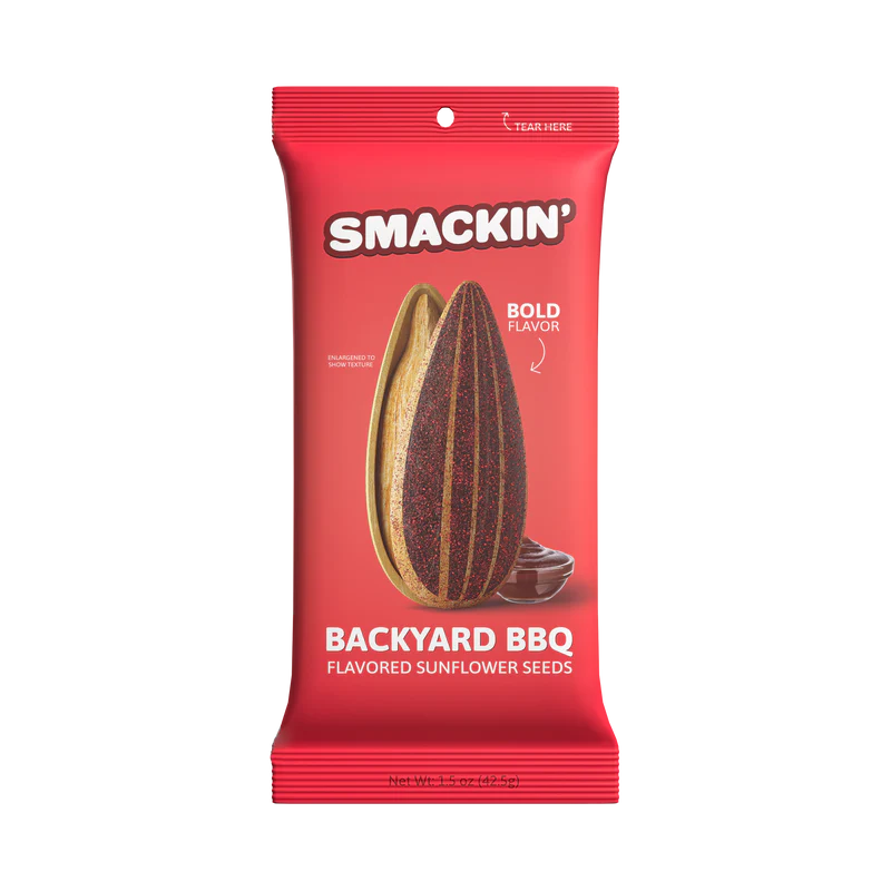 A red bag of Smackin' Sunflower Seeds - 1.5oz features jumbo seeds, a large illustrated sunflower seed, BBQ sauce, and a bold Backyard BBQ flavor label on the front.