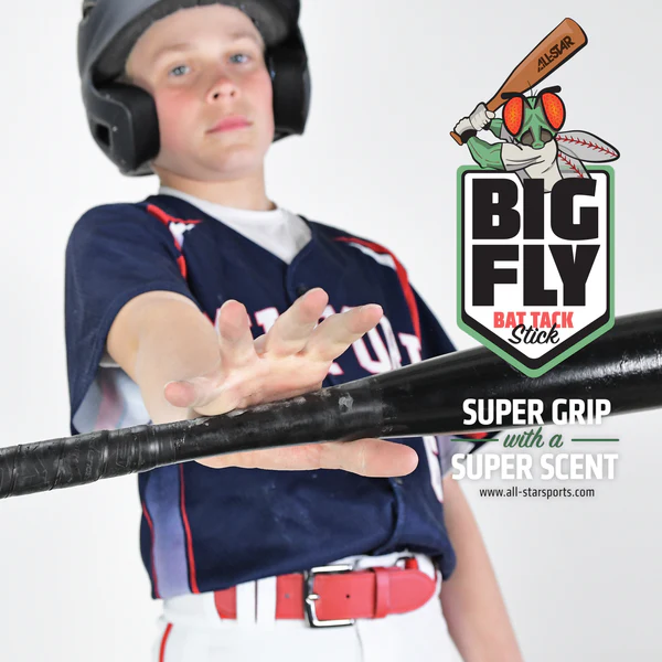 A young All Star baseball player in uniform and helmet holds a bat featuring the All Star Big Fly Bat Tack Stick: BFST1, highlighting its super grip and scent. The image displays the All Star logo and product branding.