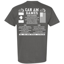 The back of the DSG Apparel 2026 NSA Can-Am Games Fastpitch Tournament Shirt features Can Am Games with USA and Canadian flags, age group team lists, Port Huron, MI event details, and the website playnsa.com.