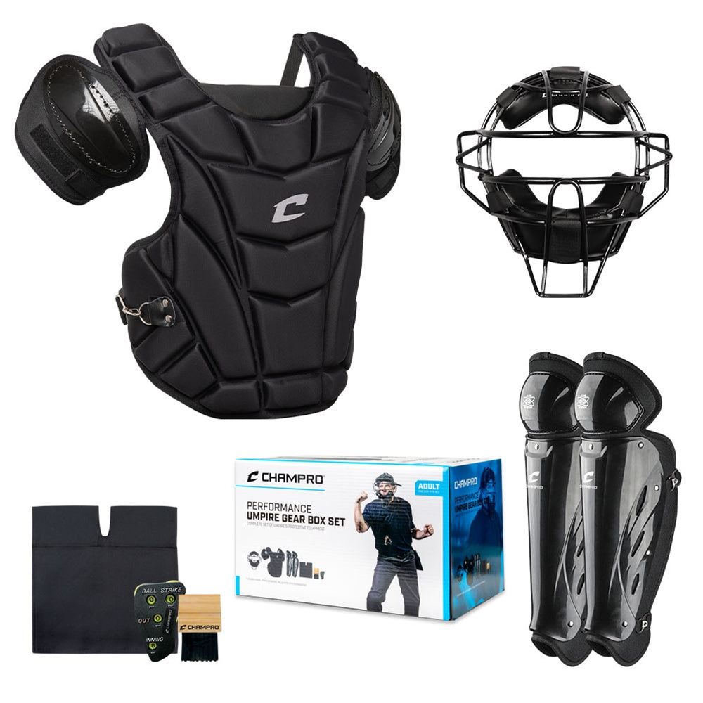The Champro Sports Umpire Starter Kit (Set of 6): CBSUSK includes a black chest protector, face mask, shin guards, wristbands, equipment bag, and comes in a retail box labeled “Champro Performance Umpire Gear Box Set.”.