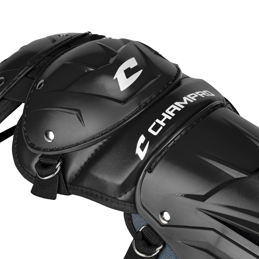 Close-up of black Champro Optimus Pro Catcher's Leg Guards by Champro Sports, featuring protective hard plastic plates, moisture-wicking lining for comfort, reinforcing rivets, and the Champro logo in white lettering.
