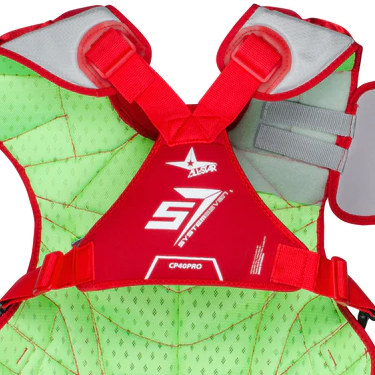 Close-up of a red and green chest protector with the All-Star logo, System7 branding, and adjustable shoulder and chest straps.