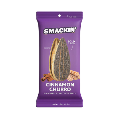 A 1.5oz Smackin' Sunflower Seeds package in purple, featuring jumbo cinnamon churro seeds and bold flavor text on the front. Enjoy bold cinnamon flavor in every bite from Smackin' Sunflower Seeds. Net wt 1.5 oz (42.5g).