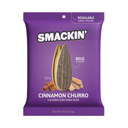 A 4oz resealable purple bag of Smackin' Sunflower Seeds - Cinnamon Churro flavor, featuring jumbo seeds, cinnamon sticks, and bold Smackin' Sunflower Seeds branding on the front.