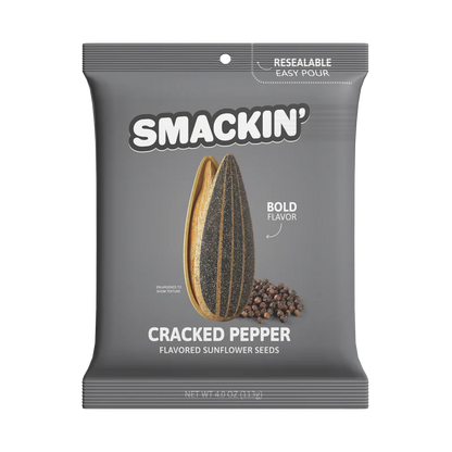 The 4oz Smackin' Sunflower Seeds - Cracked Pepper comes in a gray resealable bag with a sunflower seed and peppercorns featured on the front. Bold Flavor is highlighted, and the net weight is 4.0 oz (113g). Brand: Smackin' Sunflower Seeds.