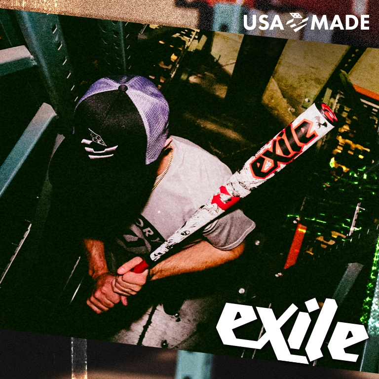 A person in a cap holds a white and red exile baseball bat while standing in an industrial setting; exile and USA MADE appear in bold text on the image.