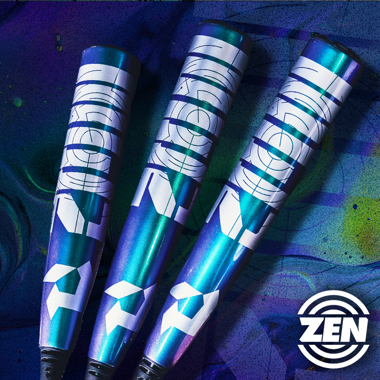 Three metallic blue and purple 2026 DeMarini ZEN Oil Slick (-10) USSSA Baseball Bats with bold white geometric designs and Dark Matter Composite barrels are arranged side by side on a vibrant background. The ZEN circular logo is at the bottom right corner.