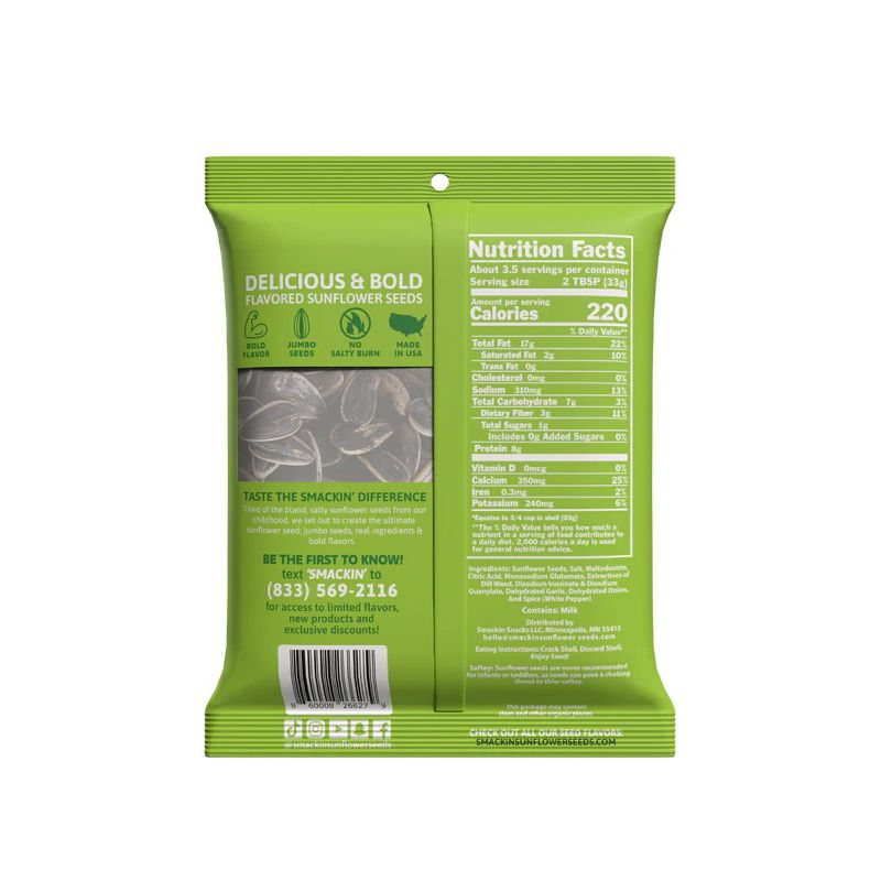 Back of a green 4oz Smackin' Sunflower Seeds bag displays nutrition facts, ingredients, branding, and a customer info phone number. Some flavored seeds are visible through a clear window on the packaging.