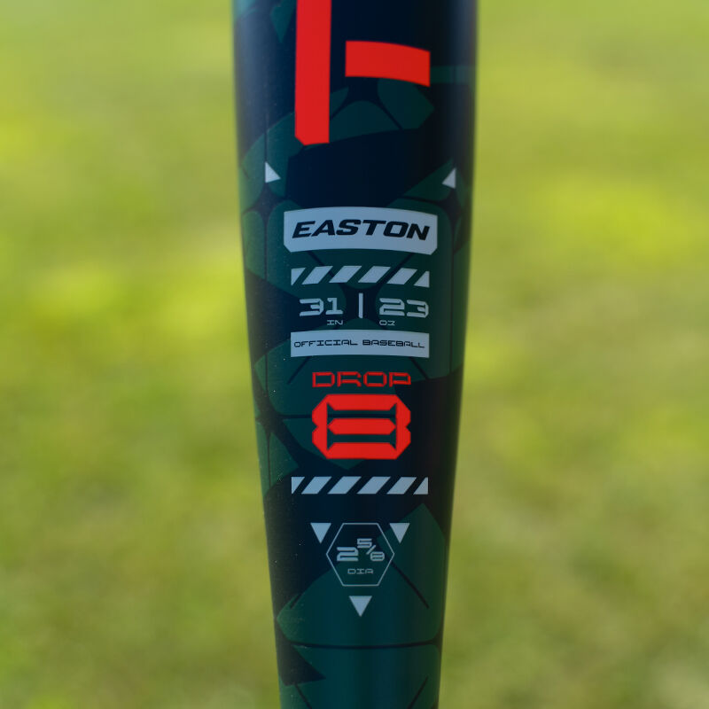 Close-up of the 2025 Easton Tango (-8) 2 5/8" USA Baseball Bat (EUS5TNG8) with green and black design, showing its label—ideal for youth players seeking a high-performance USA bat.
