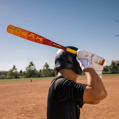 A man holding a 2025 Easton Hype Fire (-5) 2 3/4" USSSA Baseball Bat (EUT5HYP5) DEMO by Easton.