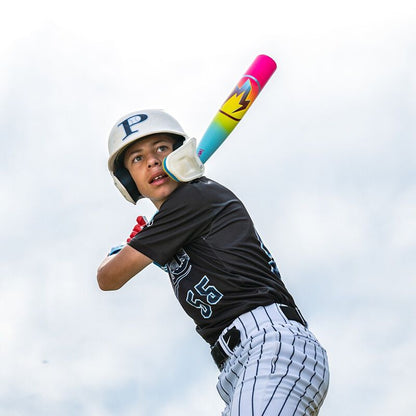 A young baseball player in a black #35 jersey and white helmet gets ready to bat with the 2026 Easton Hype Fire (-8) USSSA Baseball Bat (EUT6HYP8), focused under a cloudy sky.