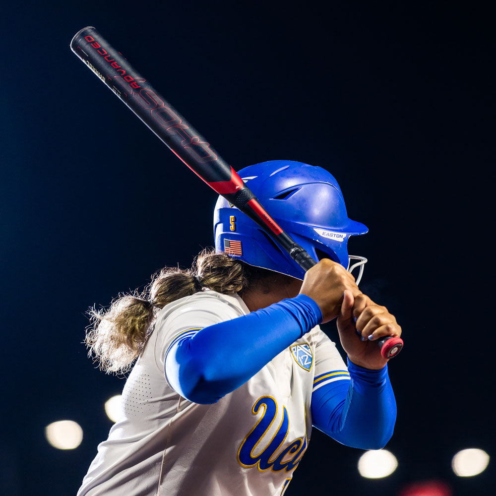 Someone holding the 2024 Easton Ghost Advanced (-9) EFP4GHAD9, a top fastpitch softball bat by Easton.