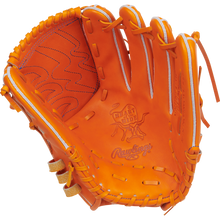 The Rawlings Heart of the Hide 11.75" Japan Series Baseball Glove (GH3FHPA15W) features orange leather, tan laces, visible stitching, and showcases the gold-embossed Heart of the Hide logo and Rawlings branding on its open palm.