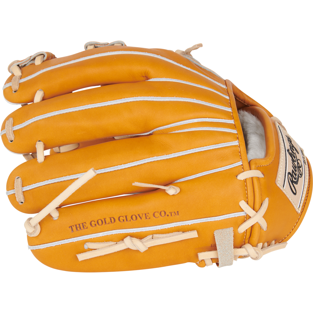 A tan Rawlings Heart of the Hide 11.5" Japan Series GR3HECK4MG baseball glove made from premium steerhide, featuring white laces and "THE GOLD GLOVE CO." on the side, is shown from above with fingers closed.