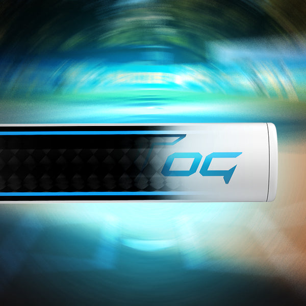 A close-up of a baseball bat with a sleek black, white, and blue design, featuring the letters OG on its barrel, against a blurred, dynamic blue and green background.