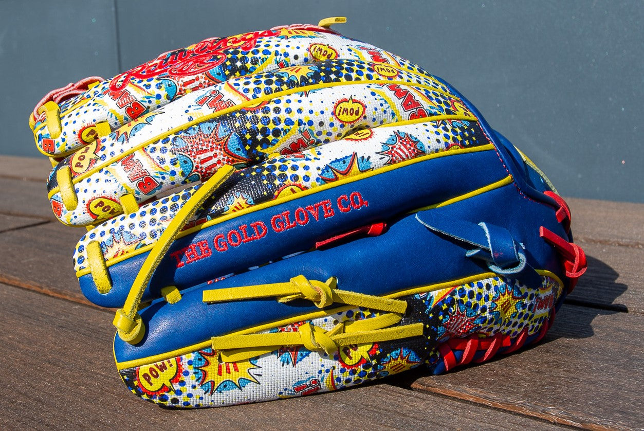 A Rawlings Heart of the Hide 12.75" Color Sync Baseball Glove (PROR3039-6RSS) sits on the table, showcasing its signature outfield design.