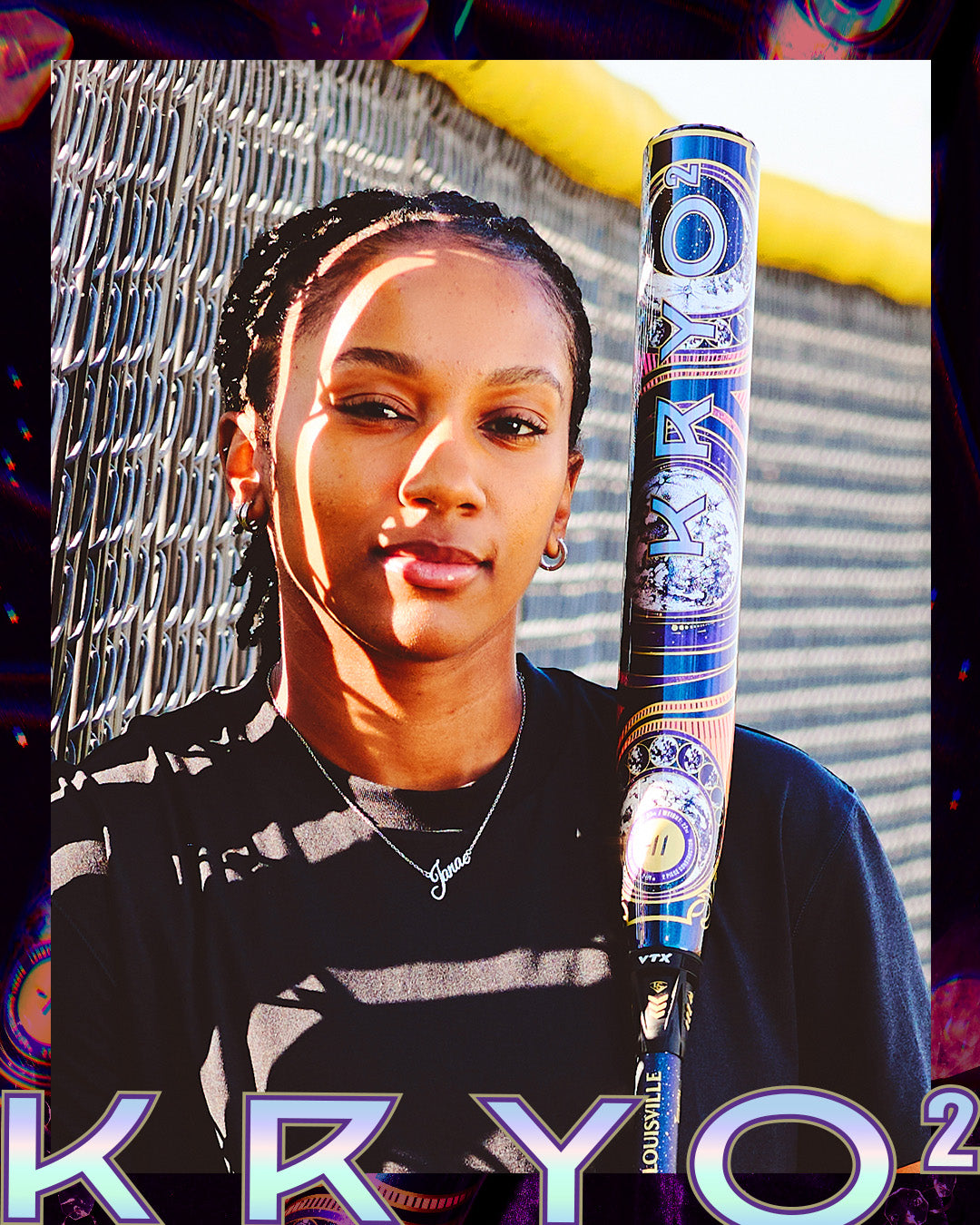 A woman stands by a chain-link fence, holding the 2027 Louisville Slugger Kryo2 Empress Fastpitch Softball Bat on her shoulder, wearing a black shirt and necklace. Bold KRYO2 text overlays the image.