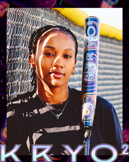 A woman stands by a chain-link fence, holding the 2027 Louisville Slugger Kryo2 Empress Fastpitch Softball Bat on her shoulder, wearing a black shirt and necklace. Bold KRYO2 text overlays the image.