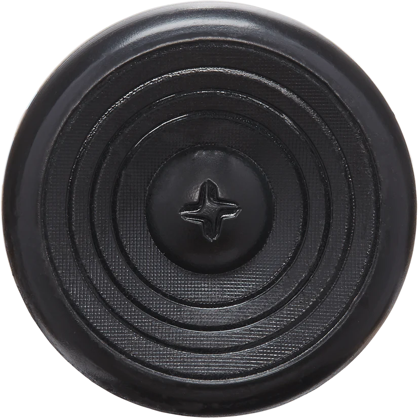 Close-up of a black, round button with concentric circles and textured surface, featuring a four-hole cross center—echoing the flared handle design of the 2025 AXE Avenge Pro 3 Hybrid (-3) BBCOR Baseball Bat (L130M-FLR) by AXE.