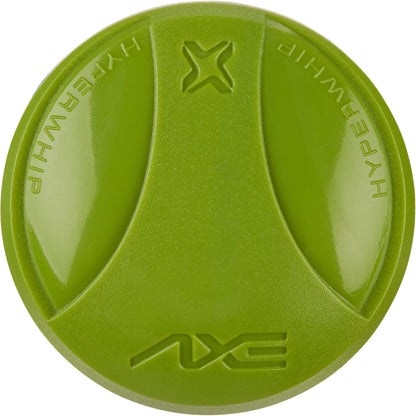 A round, green container with shiny sections and raised “AXE” and “HYPERWHIP” lettering along the edge evokes the balanced power of the 2025 AXE Disturbance 13" Balanced USA Slowpitch Softball Bat: L155P-FLR. Lid displays an "X" logo at the center.