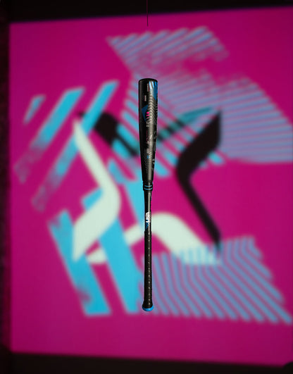 A bat in the air, like the 2024 AXE Avenge Pro 3 Hybrid (-8) 2 5/8" USA Baseball Bat: L174M, from AXE, delivers impressive power and precision.