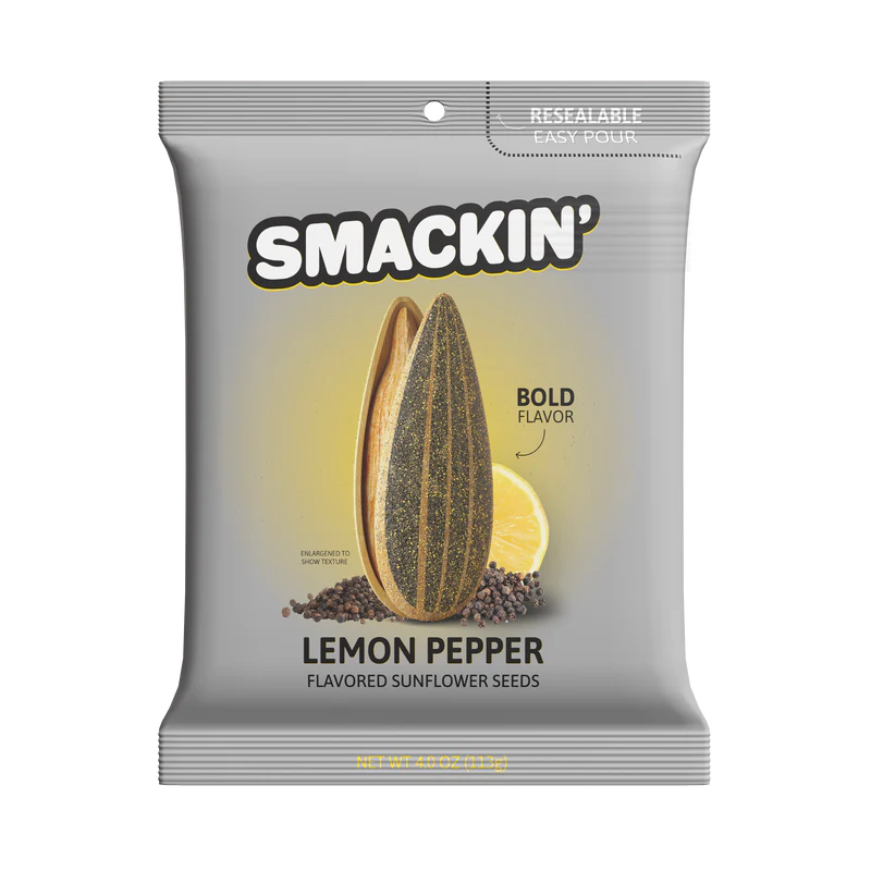 A 4oz bag of Smackin' Sunflower Seeds in Lemon Pepper flavor is shown, featuring a gray and yellow design with a sunflower seed, lemon slice, peppercorns, and "Bold Flavor" text on the front.