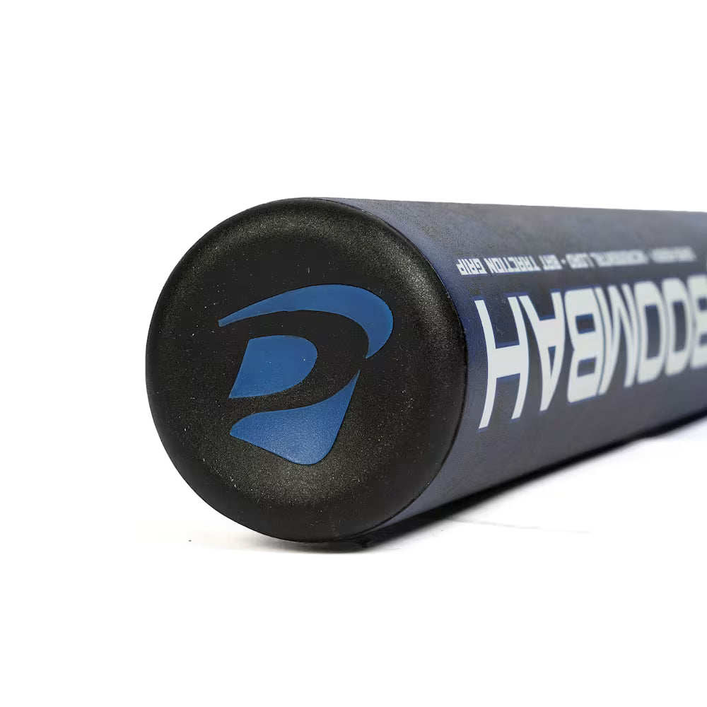 Close-up of the end cap of the Boombah 2026 BoombahPure Pure12 Blue Boom 12" Endloaded NSA USSSA Slowpitch Softball Bat (M2B0-6142 RB), showing a stylized logo and "Boombah" partially visible along the side.