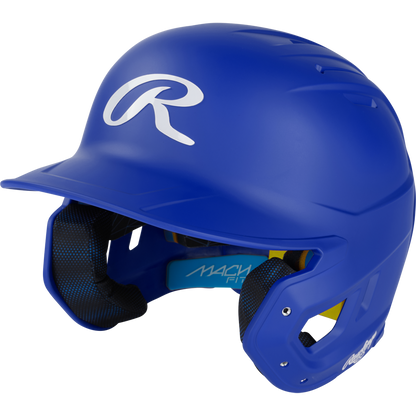 A blue Rawlings Mach Fit Matte Batting Helmet (MACHFIT) with a white R logo, black IMPAX foam padded interior, and dual ear protection, displayed on a plain white background.