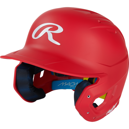 A bright red Rawlings Mach Fit Matte Batting Helmet (MACHFIT) features a white R logo, top ventilation holes, padded black and blue lining, and IMPAX foam technology for enhanced protection.