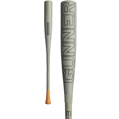 The 2024 Warstic Gunner (-3) BBCOR Baseball Bat (MBGNR24G3) features a matte gray finish, bold GUNNER barrel lettering, Flared Power Knob, and light tan grip tape. Shown side and partially front view; ideal for power hitters.
