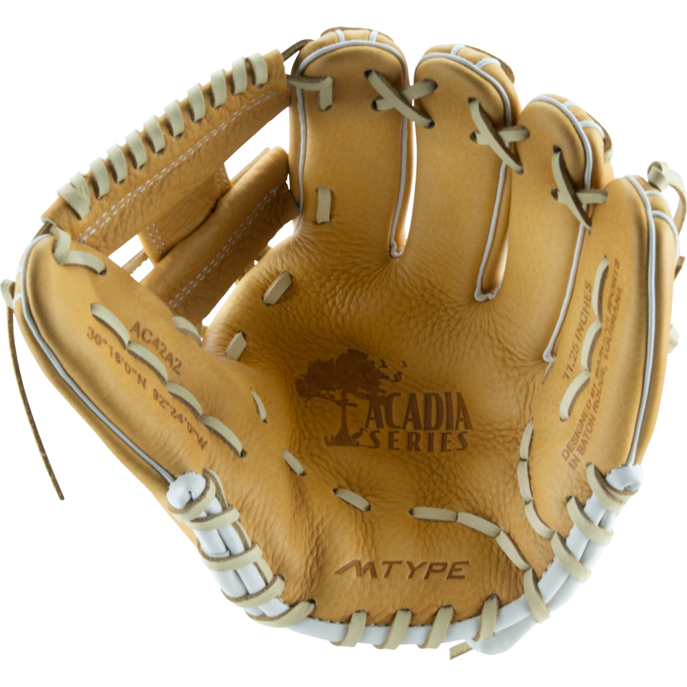 A tan full-grain cowhide Marucci Acadia 42A2 11.25" Baseball Glove (MFG2AC42A2) with white lacing is shown open, displaying "ACADIA SERIES," "ATYPE," technical details, and a tree logo stamped inside the palm.
