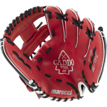 The Marucci Caddo 11.5" Baseball Glove (MFG2CD1150) features red leather with black and white accents, visible stitching, embossed Marucci branding on the palm, an open design showing its interior, finger slots, and adjustable fit.