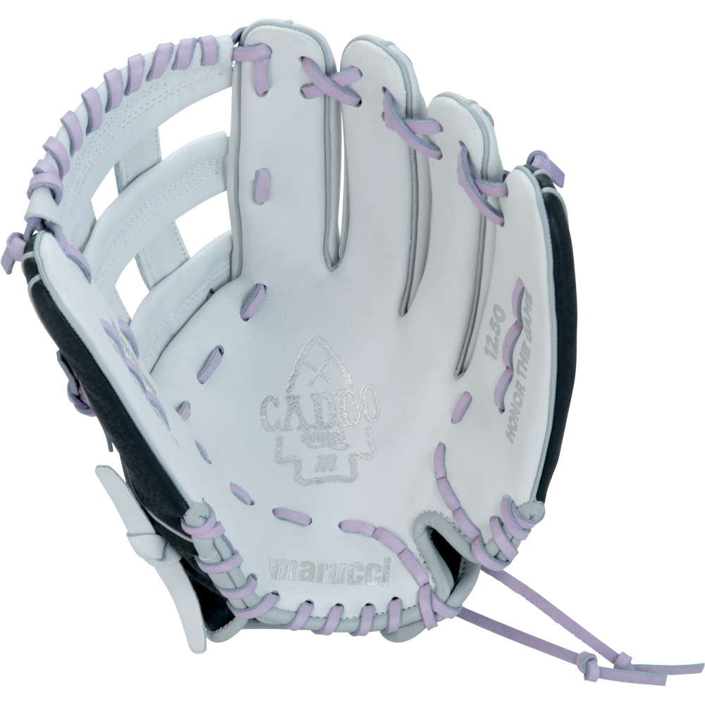 The Marucci Caddo 12.5" Fastpitch Glove (MFG2CDFP125-W/LP) is a white and black glove with light purple lacing and accents, featuring the Marucci brand and CXRBO logo on the palm.