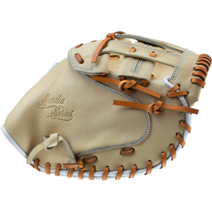 The Marucci Acadia 230C2 33.5" Fastpitch Catcher's Mitt features tan and cream full-grain cowhide leather, brown laces, detailed stitching, and "Acadia Series" embossed on the glove. Brand: Marucci. Model: MFG3AC230C2FP-CM.